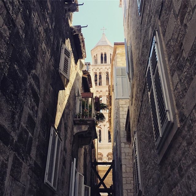 Bel tower at the end of a laneway in Split