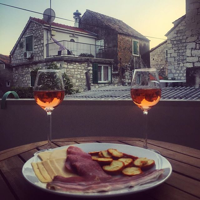 Wine & Dalmatian plate on our balcony in Split